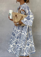 Women's V-Neck Midi Dress with Long Sleeves and Boho Print 1