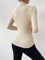 Women’s Long Sleeve Crossover Top with Waist Gathering in Soft Stretch Fabric 1